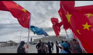 Drowning in PRC flags 