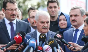Istanbul mayoral candidate Binali Yildirim speaks to the press. 