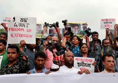 Photographers gathered at University of Dhaka, holding up their cameras in protest and demanding the immediate release of photographer Shahidul Alam. 16 October, 2018. Editorial credit: Sk Hasan Ali / Shutterstock.com
