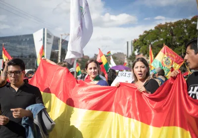 People march against alleged electoral fraud after the relection of Evo Morales.  Sucre, Bolivia. October 2019. Editorial credit: Devin Beaulieu / Shutterstock.com