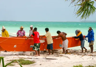 People on Tabuaeran Island, Kiribati. Editorial credit: Kara Math / Shutterstock.com