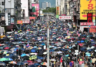 Protesters demonstrate in the district of Yuen Long in Hong Kong on July 27, 2019. Photo Credit: ANTHONY WALLACE/AFP via Getty Images.