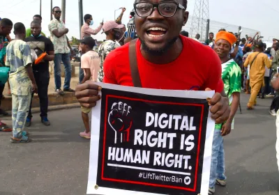 A demonstrator in Lagos holds a sign advocating for digital rights amidst nationwide protests over the Nigerian government's Twitter ban. Image credit: PIUS UTOMI EKPEI/AFP via Getty Images