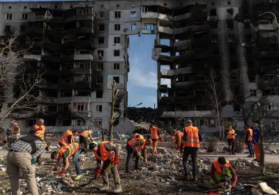 Volunteers clean up the rubbles from a destroyed residential building in Borodyanka. Following the recapture of Borodyanka by the Ukrainian forces, the city was heavily devastated and turned into ruins under intense fighting and shelling.