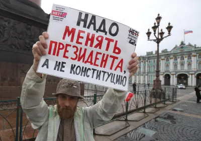 A man holds a placard during a protest against constitutional amendments in Saint Petersburg
