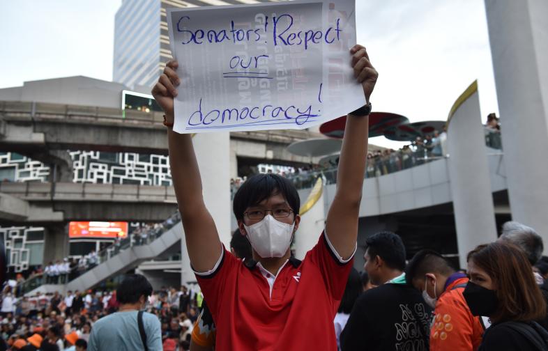 People supporting Thailand’s Move Forward Party protest in front of the Bangkok Art Culture Centre